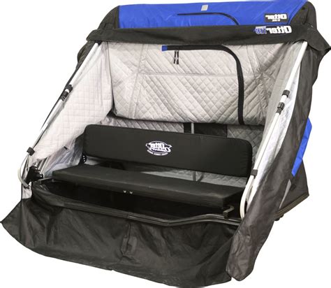 This shelter comfortably fits two to three anglers and includes a combo-case padded bench seat for long days out on the ice. . Ice fishing shelter with sled